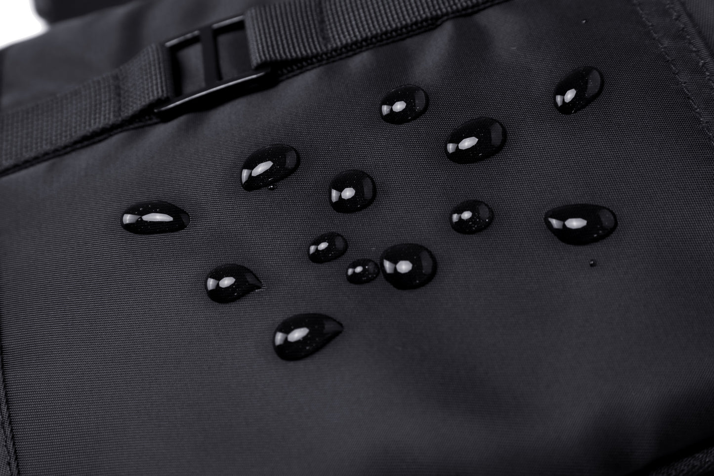 Black AeroLOFT®  ECO Anywhere Crossbody Mini Backpack