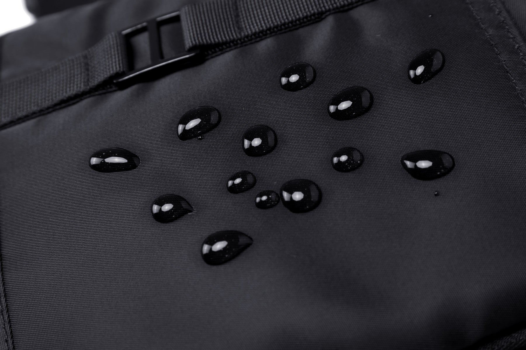 Black AeroLOFT®  ECO Anywhere Crossbody Mini Backpack